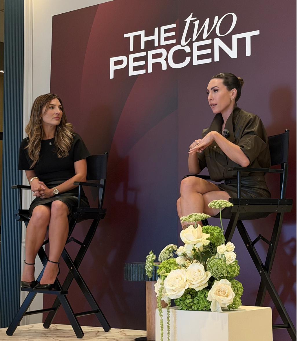 Danielle speaking on a panel at The Two Percent